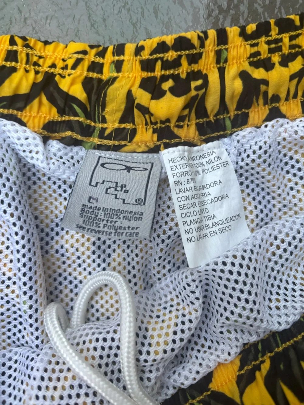 OP Men’s Yellow Floral Swim Trunks with Black and Green Pattern